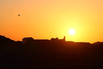 Skomer accommodation at sunset