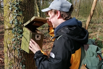 Cardiff Stand for Nature group looking at nest boxes