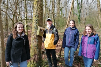 Cardiff Stand for Nature group looking at nest boxes