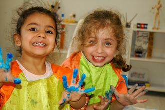 2 pre-school children painting