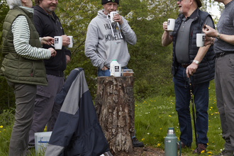 Volunteers catching up over a tea