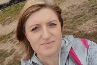 Selfie of Nicola at the beach. 