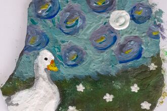 White duck painted onto a slate