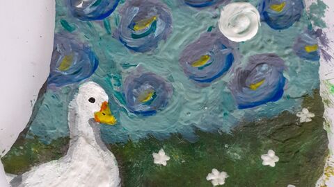 White duck painted onto a slate