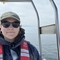 Bea in a boat a sea. 