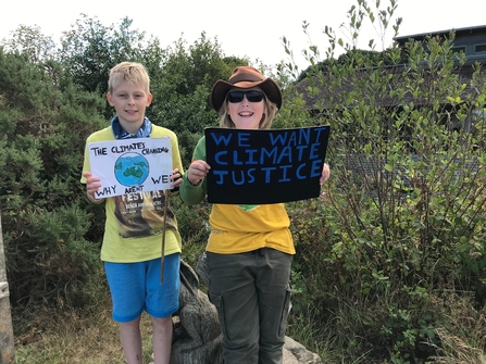 Living Seas Youth Forum members protesting 