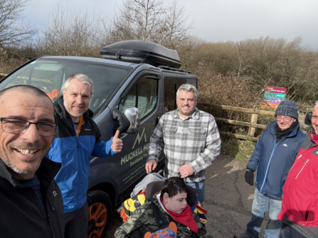 Lads and Dads visiting Parc Slip with child in wheelchair