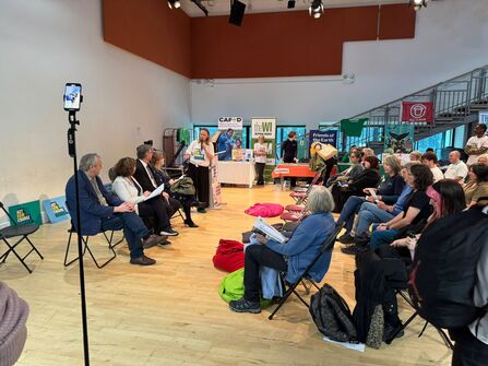 Panel discussion with crowd and panel members