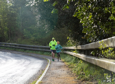 Two people running